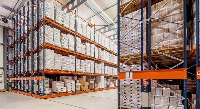 Warehouse storage racks arranged to maximise vertical and floor space utilisation